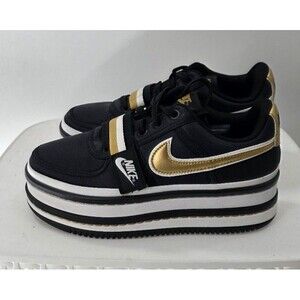 Nike Women's Vandal 2K in the Black Metallic Gold colorway Platform